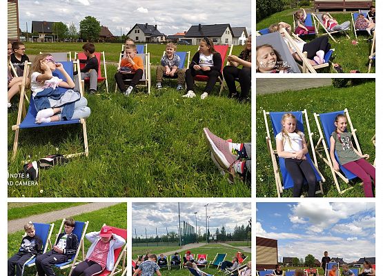 uczniowie klasy 3a leżą na leżakach