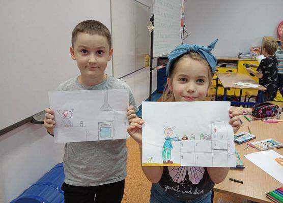 Uczniowie klasy 2a z ilustracjami do Książki Pan Kuleczka
