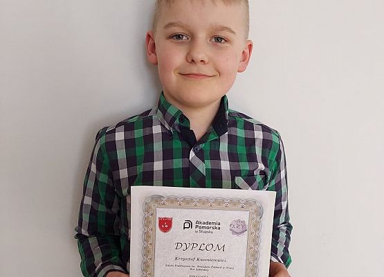 Krzysztof Kusznierewicz z dyplomem