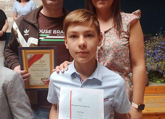 Antoni M. z rodzicami